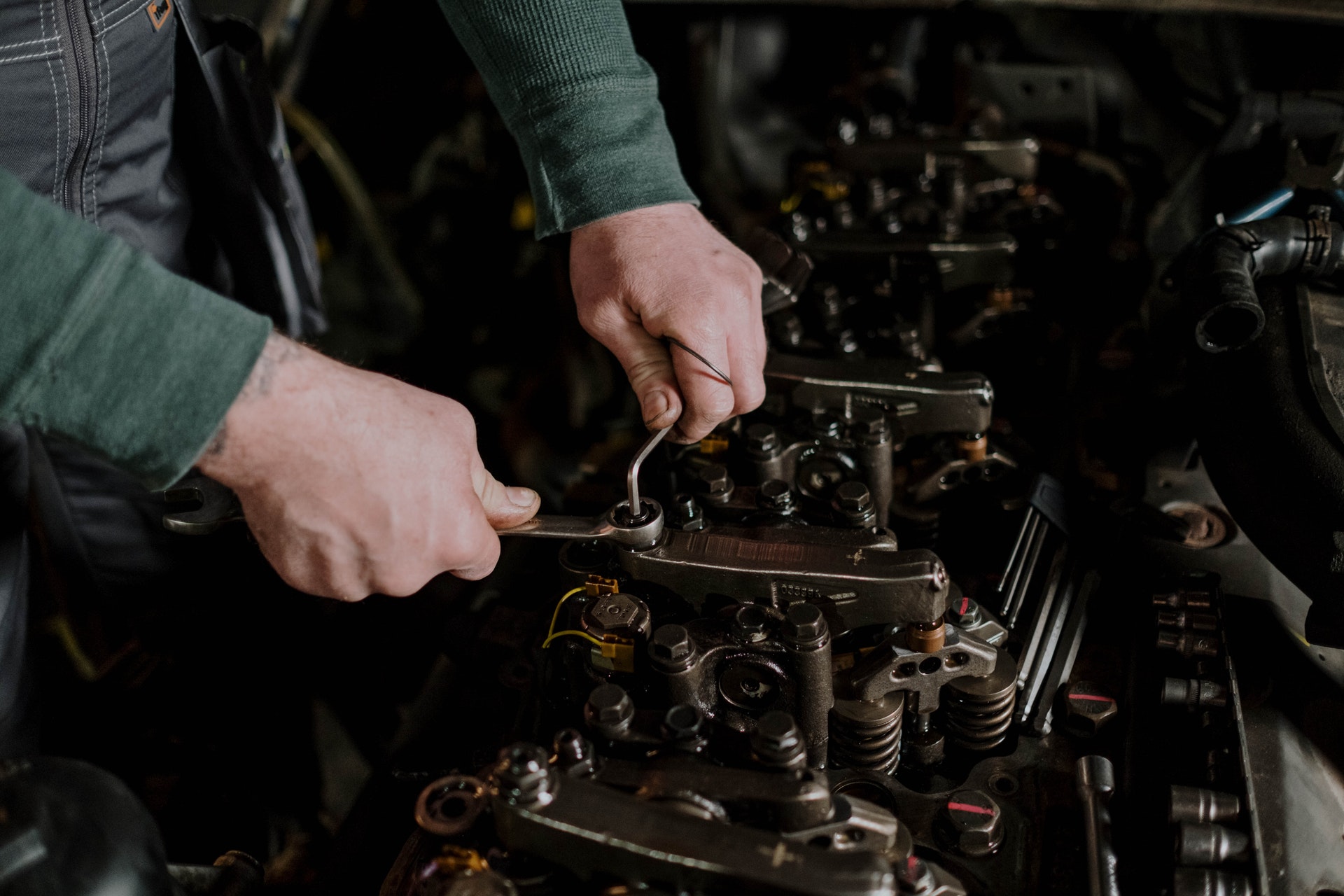 mechanic working on a car.